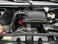 The image shows the engine compartment of a 2023 Mercedes-Benz Sprinter with various components including an air filter housing and fluid reservoirs