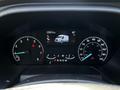 Dashboard of a 2023 Ford Transit showing speedometer fuel gauge and digital display with mileage reading of 12083.9 km