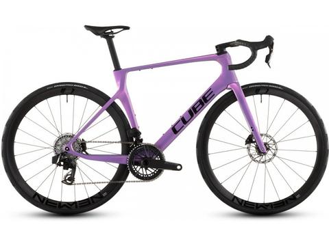 A purple 2026 Cube Agree C:62 SLX road race bike featuring a sleek frame aerodynamic design and disc brakes with black wheels and gear components