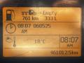 Dashboard display of a 2005 Volvo VND 122 showing fuel level distance to empty time and temperature