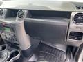 Interior view of a 2006 Land Rover LR3 dashboard featuring ventilation controls audio system and storage compartments