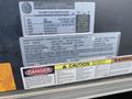 A 2020 Stealth Enterprises Trailer with various labels displaying weight limits and manufacturing information