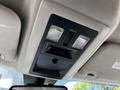 Interior view of a 2015 RAM 5500 overhead console featuring two lights and a storage compartment