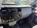 Interior view of a 2014 Ford F-250 SD featuring a dashboard with audio controls and a textured surface labeled Super Duty