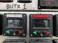 Two control panels from a 2009 Spartan Gladiator featuring buttons and displays labeled for foam operations