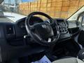 Interior view of a 2017 RAM Promaster showing the steering wheel dashboard and center console with climate controls and audio system