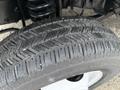 Close-up of a tire from a 2019 Ford Econoline showing its tread and texture