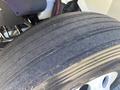 Close-up of a worn tire on a 2018 International DuraStar showing significant tread wear and visible grooves