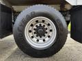 Close-up of a Goodyear G622 RSD tire mounted on a wheel with visible lug nuts and a shiny silver rim