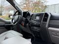 Interior view of a 2019 Ford F-350 SD showcasing the front dashboard and center console with controls and a touchscreen display
