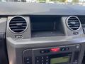 Interior dashboard of a 2006 Land Rover LR3 featuring air vents and control panel with radio display and buttons for various settings