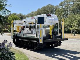 A 2014 Achiever DPM52MH equipped with a boom arm and tracks for mobility designed for various industrial applications