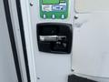 Close-up of the door handle and lock mechanism on a 2016 Chevrolet Express van