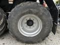 Close-up of the large wheel and tire of a 2020 Pottinger Impress with visible tread pattern and silver rim