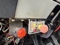 Control panel with red and yellow buttons labeled P.T.O and electrical connections on a 1998 Freightliner FL80