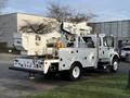 A 2013 International Durastar 4300 bucket truck with a white utility bed and an Altec aerial lift attachment mounted on the back