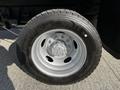 Close-up of a wheel from a 2018 Ford F-550 showing the tire tread and metal rim details