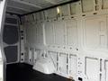 Interior of a 2019 Mercedes-Benz Sprinter showing empty space with metal walls and a clean floor designed for cargo transport
