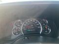 Dashboard of a 2016 GMC Savana showing speedometer fuel gauge and warning lights