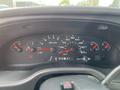 Dashboard of a 2008 Ford Econoline showing speedometer fuel gauge and various indicators