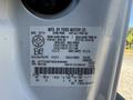 A 2014 Ford F-250 SD vehicle identification label displaying vehicle specifications and details including weight ratings and manufacturing information