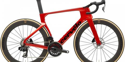 A 2026 Cervélo S5 Force AXS road bike in red with aerodynamic design and deep-section wheels
