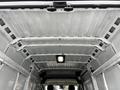 Interior view of the cargo area of a 2021 RAM Promaster showcasing the ceiling structure and lighting features