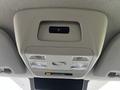 Interior overhead console of a 2023 Ford Transit featuring lights and controls