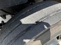 Close-up of a worn tire from a 2022 Blue Bird BB Conventional showing tread wear and grooves