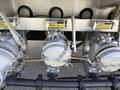 Close-up of fuel system components for a 2009 International 7500 featuring fuel pumps with labels indicating kerosene and diesel fuel types