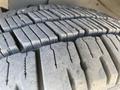Close-up view of a tire tread on a 2020 Chevrolet Express showing distinct patterns and grooves designed for traction and stability