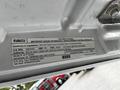 A 2016 Ford F-550 vehicle identification label with engine and emissions information displayed on the underside of the hood