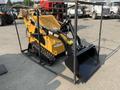 2025 AGT MX-MZT14 Mini Loader with tracks and a front bucket attached for various loading tasks