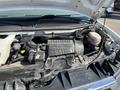 The image shows the engine compartment of a 2016 GMC Savana with a Vortec engine and various engine components visible