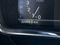 Odometer reading displaying 30968.6 km in a car dashboard of a 2013 Lincoln MKT