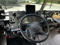 Interior view of a 2008 Morgan Olson Workhorse with a steering wheel dashboard and various controls including gauges and a monitor