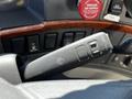 Close-up of the control stalk of a 2005 Volvo VND 122 showing buttons for wipers and other features