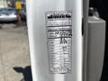 A service record sticker attached to a 2020 Chevrolet Express detailing service performed including date and mileage along with specific maintenance items and statuses