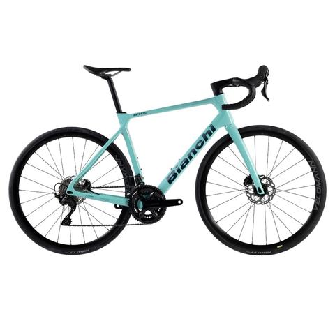 2026 Bianchi Infinito Shimano 105 Di2 Carbon Endurance Road Bike in a light turquoise color with slim tires and disc brakes