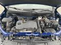 The engine bay of a 2022 Chevrolet Equinox featuring a large engine cover labeled Ecotec various components and fluid reservoirs visible