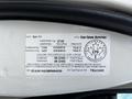 2011 Dodge Grand Caravan with a vehicle information label displaying tire sizes and specifications