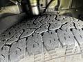 Close-up of a textured tire tread on a 2022 Ford Transit showcasing detailed patterns and grooves