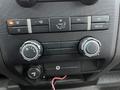 Dashboard controls of a 2010 Ford F-150 including climate controls and air conditioning settings