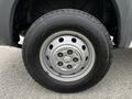 Close-up of a gray wheel and tire from a 2018 RAM Promaster showing a six-bolt pattern and tread design on the tire