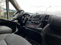 Interior view of a 2018 RAM Promaster showcasing the driver's seat dashboard and controls