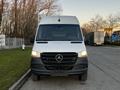 A 2019 Mercedes-Benz Sprinter van facing forward with a white body and black lower front bumper