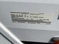 A label from a 2013 Outdoor Wind River RV detailing manufacturing information specifications and tire size