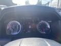The dashboard of a 2021 RAM 1500 showing speedometer, tachometer, and various gauges with digital readout indicating 0 km/h and temperature at 22 degrees Celsius