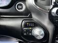 Interior dashboard controls of a 2019 RAM 1500 including gear shift display and four-wheel drive selector knob
