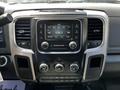 Dashboard of a 2015 RAM 5500 featuring a central touchscreen display with radio controls and air conditioning knobs